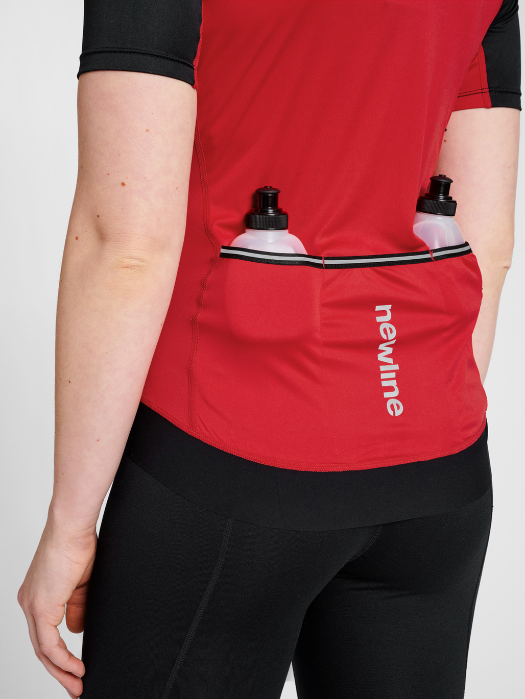 WOMENS CORE BIKE JERSEY, TANGO RED, model